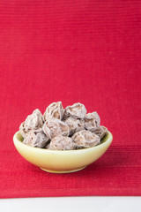 Salted Plum Tamarind Food Snack on a Background