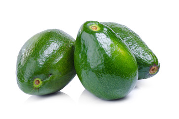 green avocados isolated on the white background