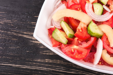 Salad with cucumbers and tomatoes