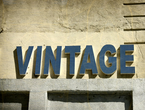 aged and worn photo of vintage sign