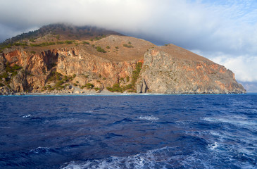 The mountainside on the sea coast on the island of Crete.