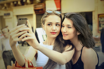 Two girls taking a picture of themselves