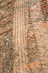 Wheel tracks on red lateritic soil