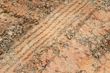 Wheel tracks on red lateritic soil