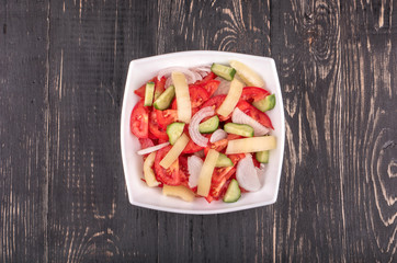 Salad with cucumbers and tomatoes