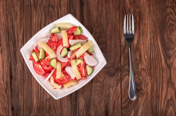Salad with cucumbers and tomatoes