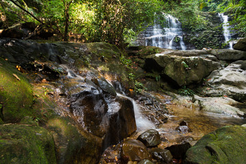 Waterfall in Borneo jungle near Kuching in Sarawak state of Malaysia