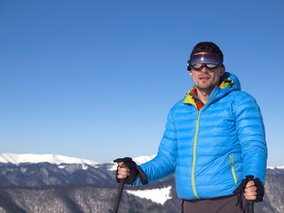 Portrait of a man in the mountains.