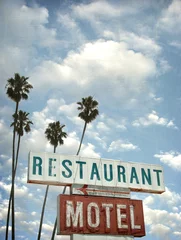 Garden poster Buffet, Bar aged and worn vintage photo of motel and restaurant neon sign with palm trees