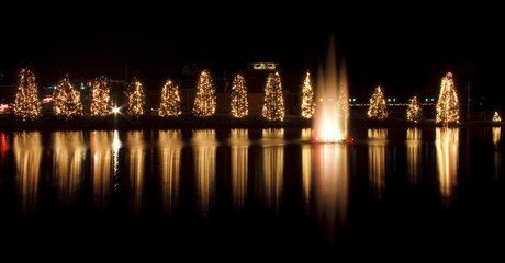 Fototapeta na wymiar McAdenville Christmas Lights Around a Lake in North Carolina