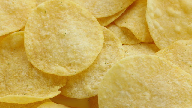 Tasty potato chips. Potato chips, close-up 4K footage.
