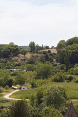Small Village in a Rural Landscape. A high view point photo of a small rural community in France.