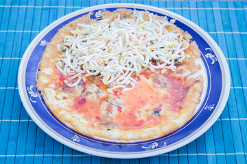 Thai food, fried mussel pancake in hot pan
