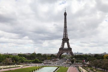 Fototapeta na wymiar View on Eiffel Tower in Paris, France. Cloudy day