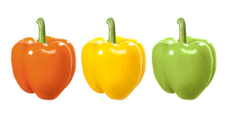 Red, yellow and green bell peppers on a white background