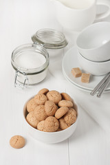 Amaretti Biscuits. Kitchenware. White Wooden Table