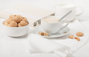 Amaretti Biscuits. Cup Of Cappuccino Coffee. Lump Demerara Sugar