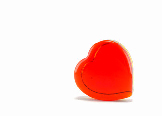 Heart shape of red glass isolated on white background