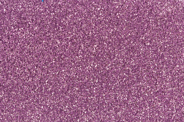 Purple glitter texture abstract background.