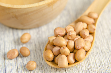 beans in wooden spoon