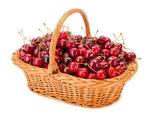 Fototapeta na wymiar Sweet cherries (Prunus avium) in wicker basket
