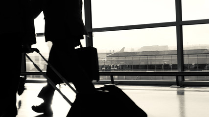 Airport business passenger silhouette black and white.