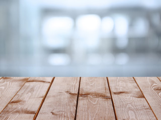Wooden table  with abstract  blur background
