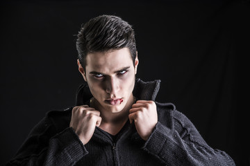 Portrait of a Young Vampire Man with Black Sweater