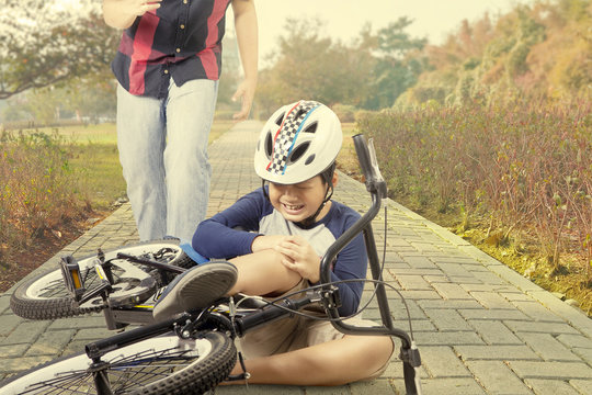 Child Crying After Falling From Bicycle