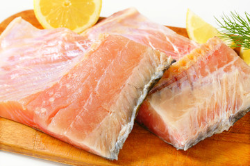 Raw carp fillets