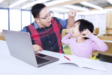 Girl screaming on her teacher in the class