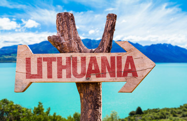 Lithuania wooden sign with lake background