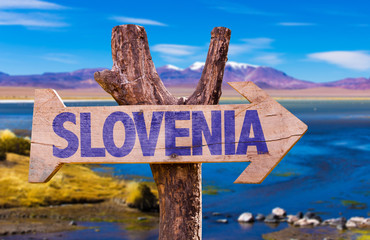 Slovenia wooden sign with river on background