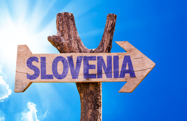 Slovenia wooden sign with sky background