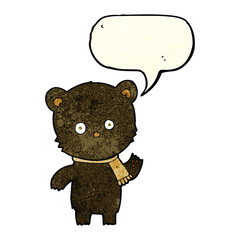 cartoon waving black bear with speech bubble