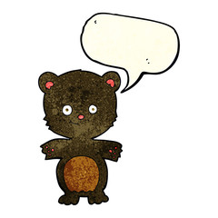 cartoon happy black bear with speech bubble