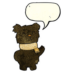 cartoon waving black bear with speech bubble