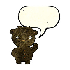 cartoon waving black bear with speech bubble