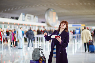 Beautiful young female passenger at the airport