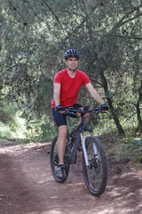 Obraz premium Man riding a bike