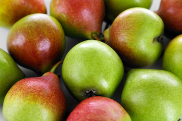 Heap of ripe tasty pears close up