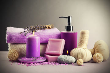 Fototapeta na wymiar Spa treatments isolated on colorful background. Lavender spa concept