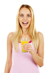 Young beautiful woman with glass of fresh orange juice, isolated on white