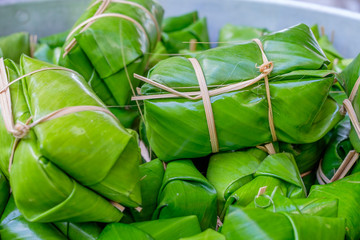 blur Glutinous rice steamed in banana leaf (thai dessert)