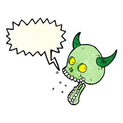 Fototapeta premium cartoon spooky skull with speech bubble