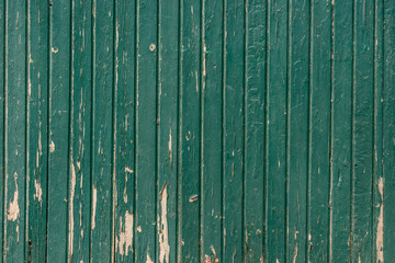 Wooden background with weathered paint