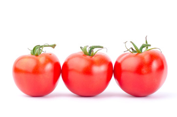 Fresh tomatoes on white background