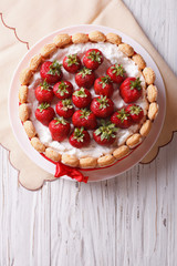 French Fresh Strawberry charlotte cake. vertical top view
