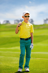 Portrait of boy golfer 