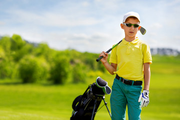 Portrait of boy golfer 